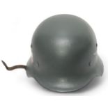 A WW2 German Third Reich M35 Heer helmet, stamped EF62/ 801, 8-tongue leather liner stamped '55,'