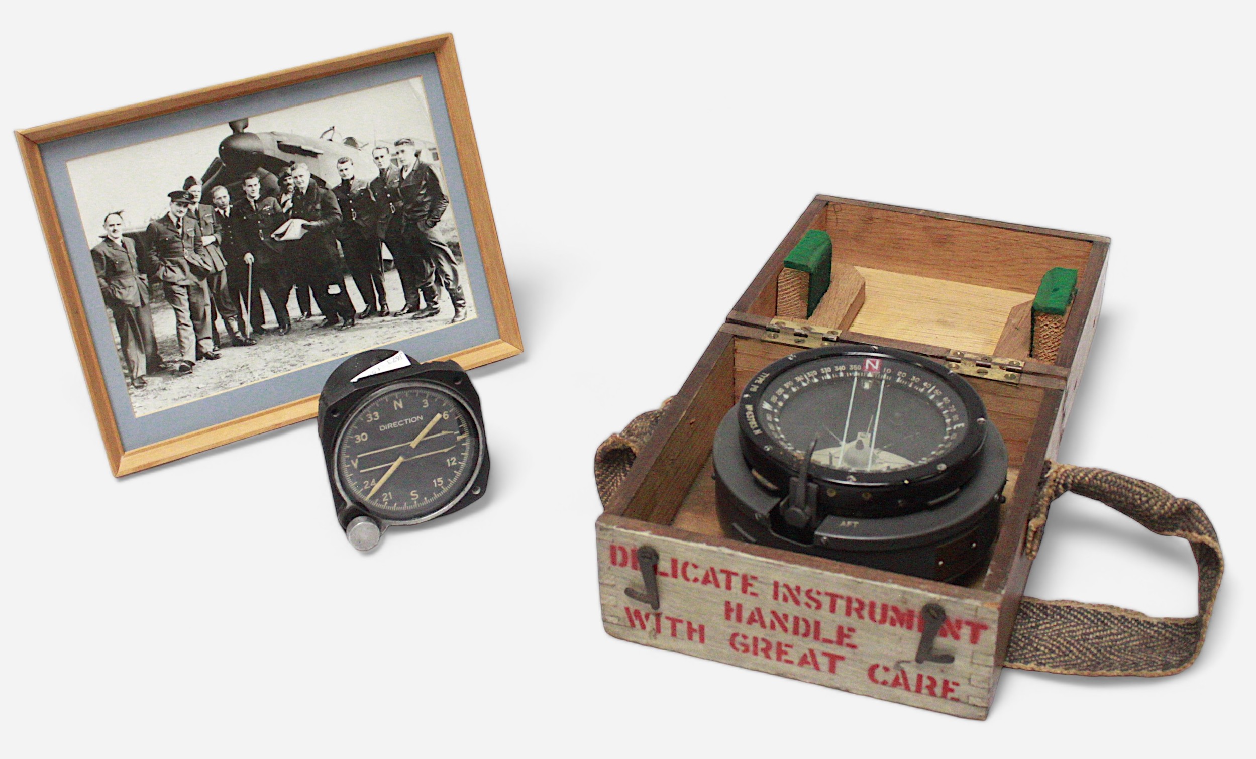 An Air Ministry marked Type P8 Compass and original wooden carry case, primarily fitted to the