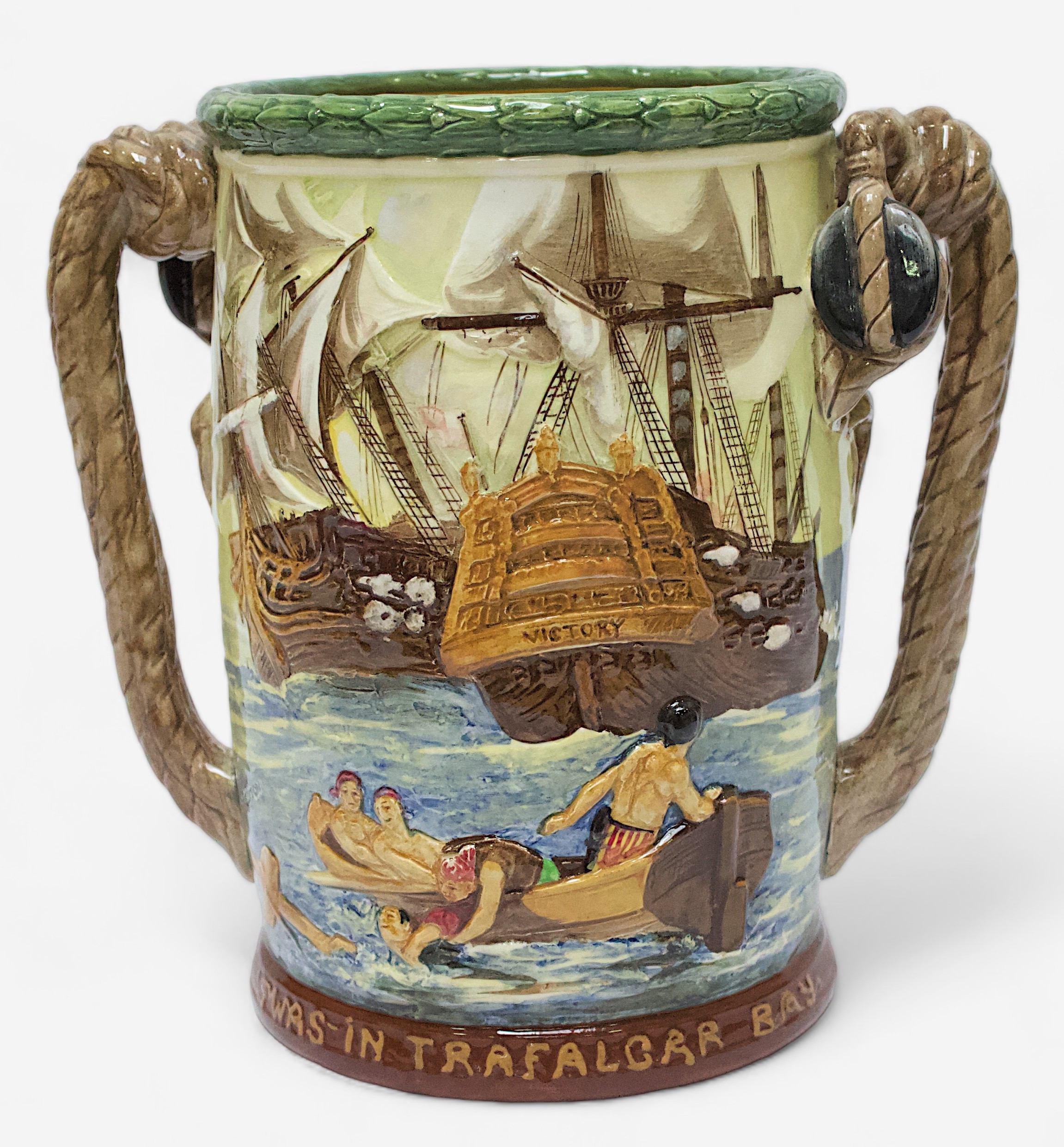 A Royal Doulton loving cup, 'Nelson’, designed by Charles Noke and Harry Fenton, with inscriptions '