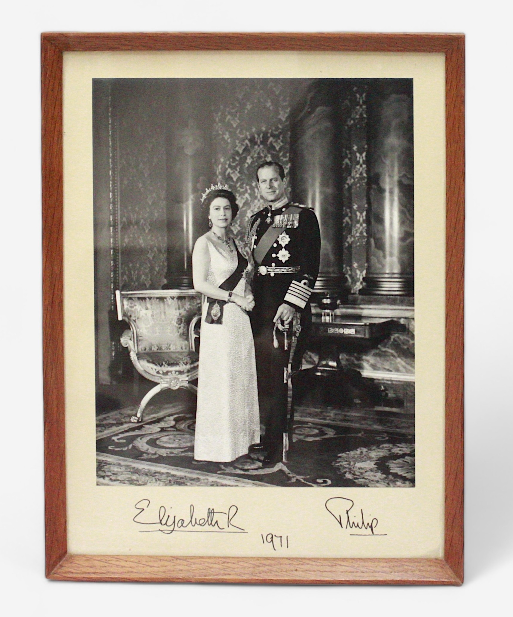 A signed monochrome photograph of Queen Elizabeth II and The Duke of Edinburgh, 1971, presented to