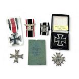 A WW2 German Third Reich Iron Cross 1st Class, boxed, together with an Iron Cross 2nd Class with