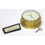 A WWII Smiths Astral brass cased military ship’s bulkhead clock, AP160174, the white painted with