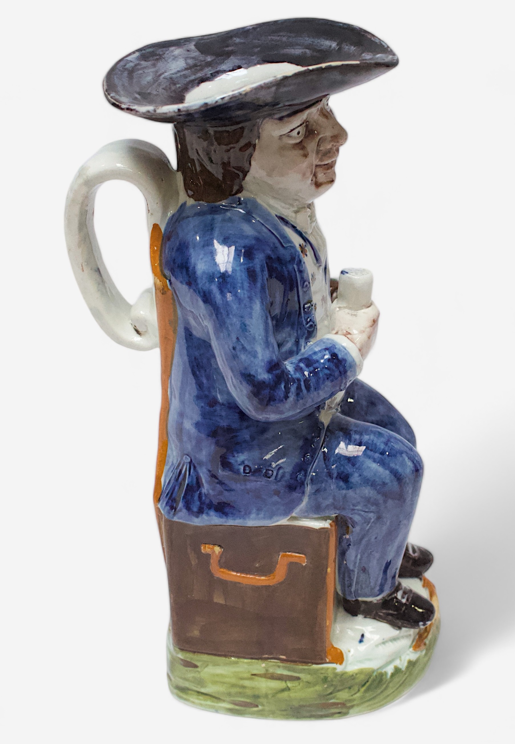 A Prattware ‘Sailor’ toby jug, c1790-1810, blue frockcoat and britches, waistcoat painted with - Image 2 of 4