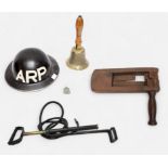 A WW2 Air Raid Precaution handbell, wooden gas alarm stamped 'A.R.P. W. CLEMENTS & Sons, 1939,'