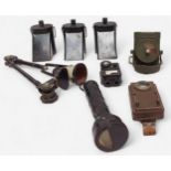 A collection of assorted WWII lamps, comprising three Air Raid Precautions (A.R.P.) lamps with