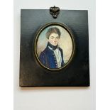 An early 19th century oval portrait miniature of a Junior naval officer, inscribed verso ‘c.1810,’