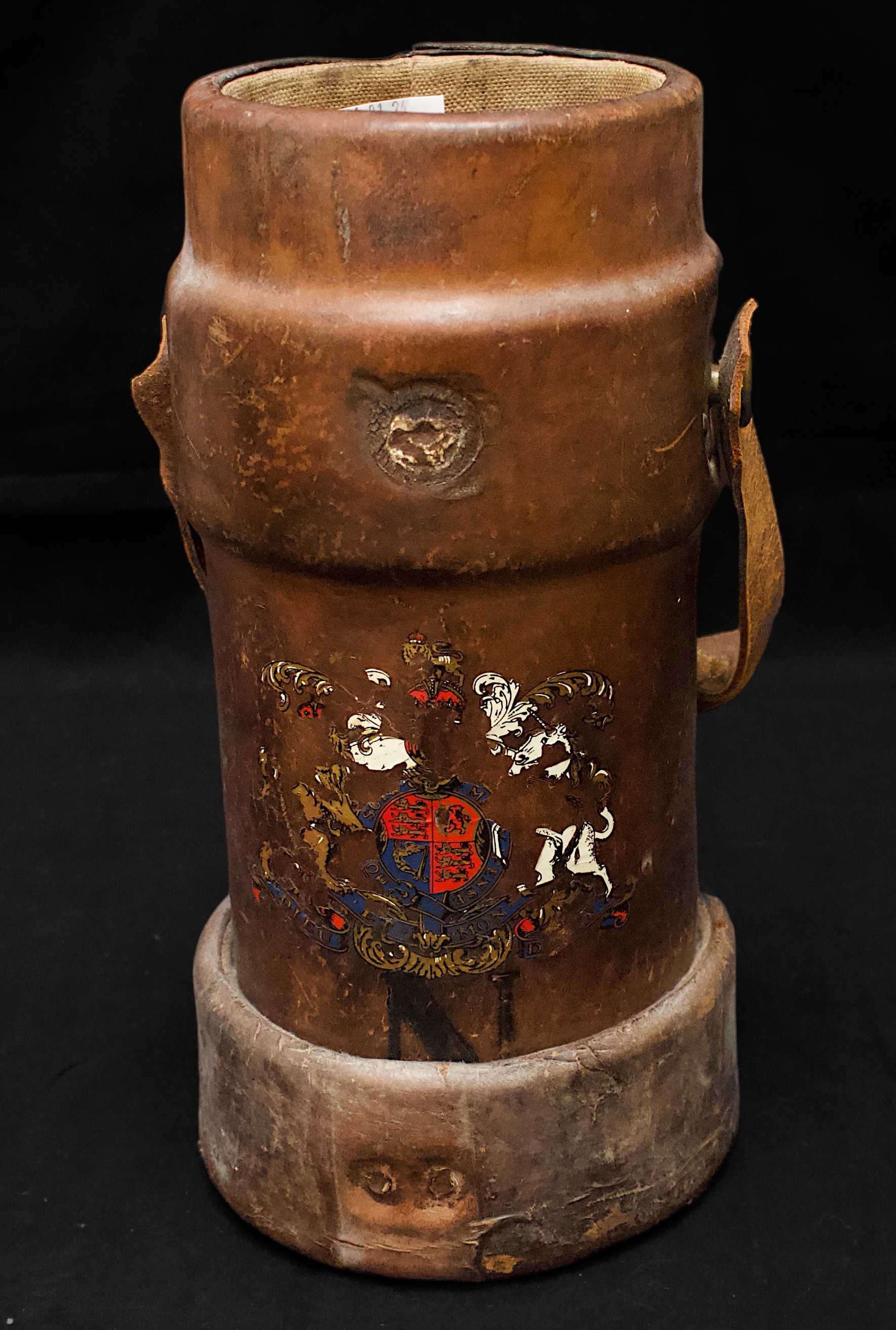 A 19th century Cordite carrier with Royal crest to front and leather carry handle, 31cm tall