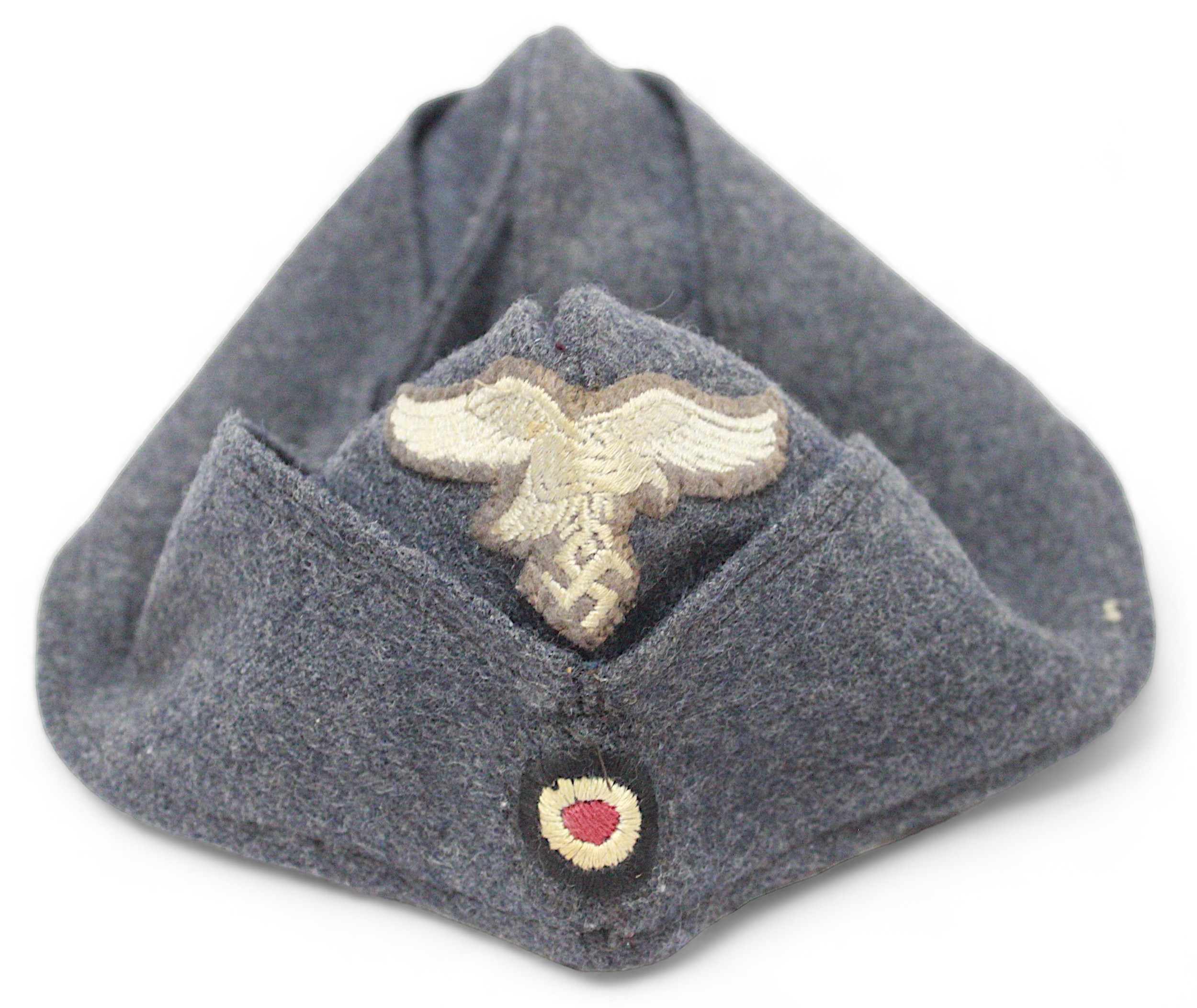 A WWII German Third Reich Overseas Artilery M38 Side cap, with original bevo cap eagle and cockade - Image 3 of 3