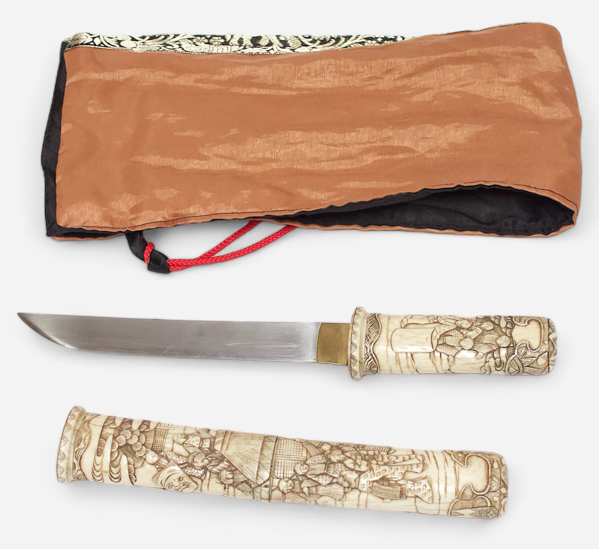 A Meiji Period (1868-1912) Japanese Tanto Knife, relief carved bone handle and scabbard decorated