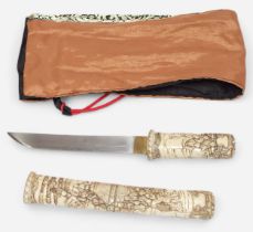 A Meiji Period (1868-1912) Japanese Tanto Knife, relief carved bone handle and scabbard decorated