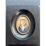 An early 20th century oval portrait miniature, inscribed in pencil verso, ‘Geoffrey Charles