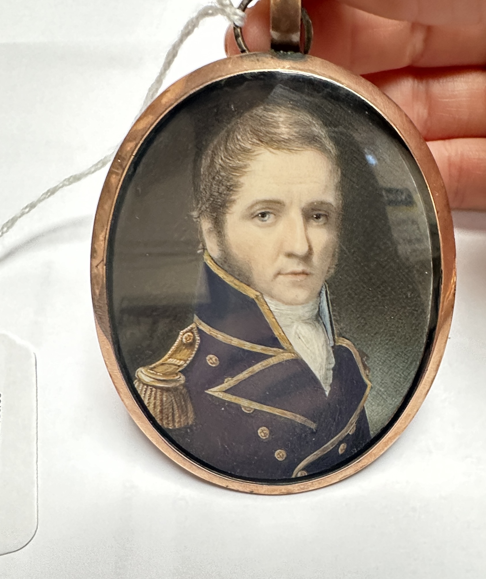 A Mid-19th century oval locket-back portrait miniature of a middle-aged senior Naval officer, with - Image 2 of 5