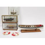 A collection of assorted scratch and kit built scale model boats including a small model of the