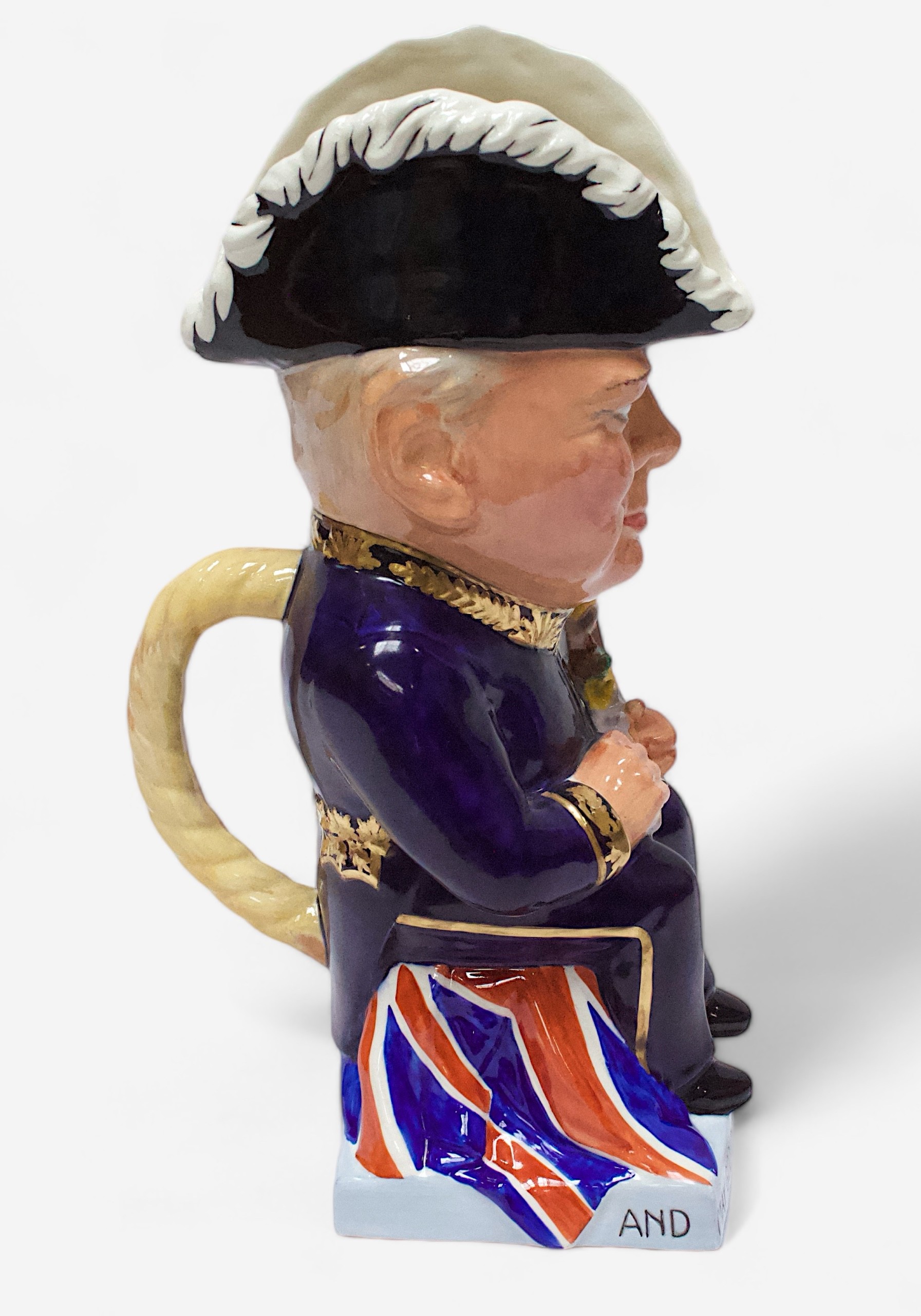 A Wilkinson Limited Royal Staffordshire Pottery ‘Clarice Cliff’ toby jug, modelled, c1940, in the - Image 2 of 6