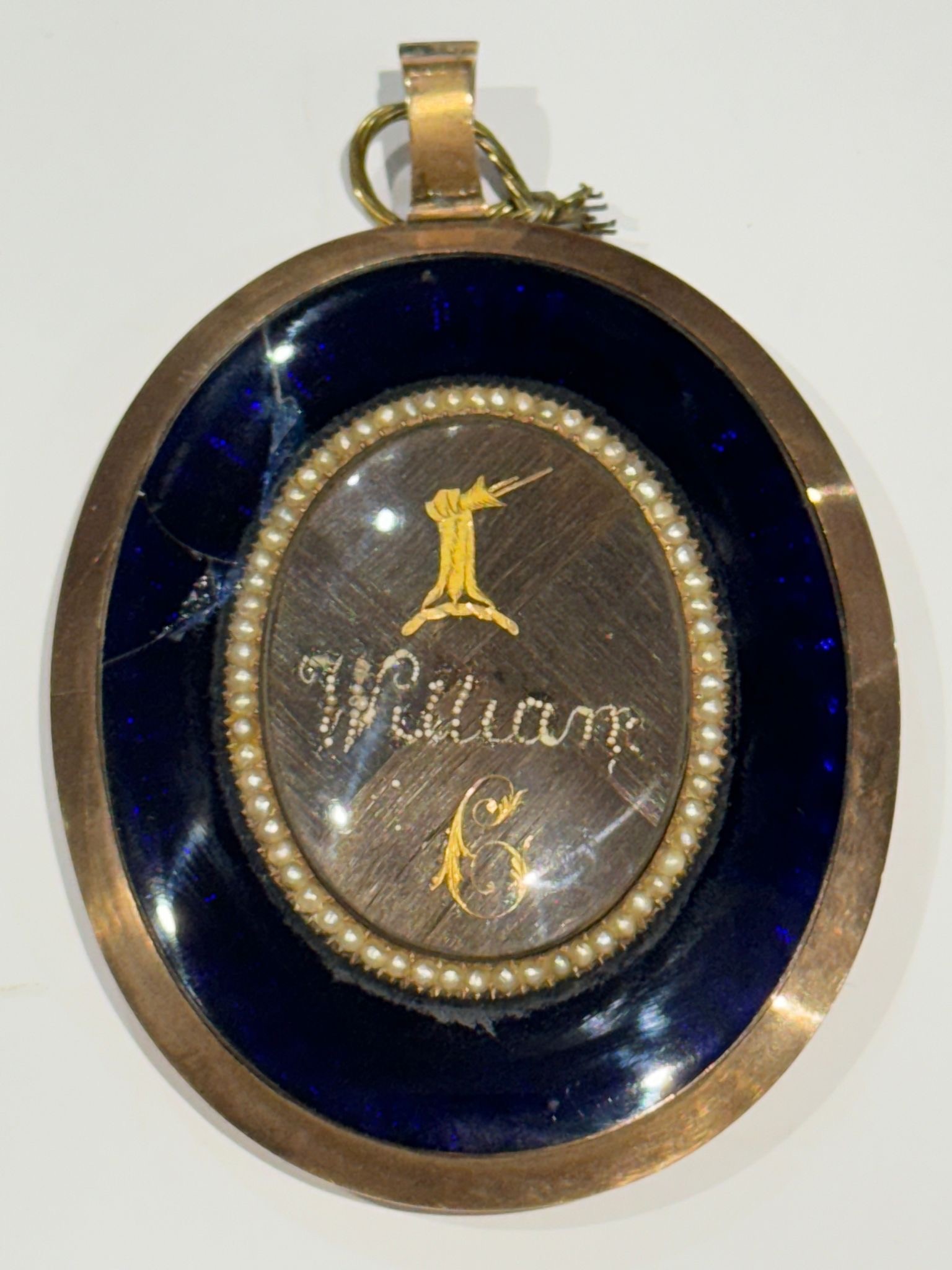 An early 19th century oval locket-back portrait miniature of a Junior Naval officer, with dark brown - Image 2 of 6