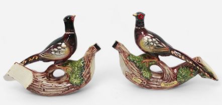 Two ceramic liqueur decanters made and bottled by Garnier, both modelled as pheasants perched on a