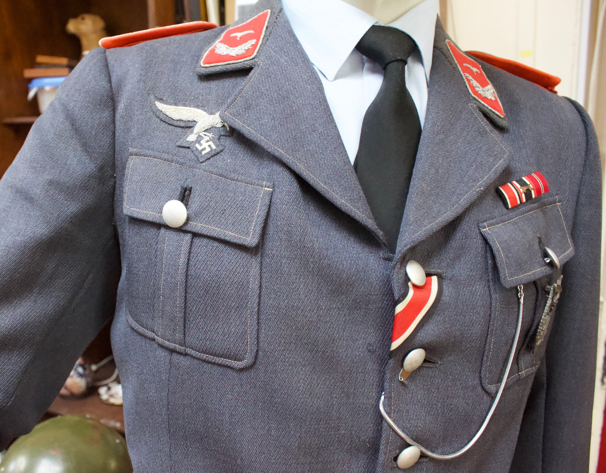A WWII German Third Reich Luftwaffe uniform on mannequin dummy, comprising peaked cap, jacket with - Image 5 of 5