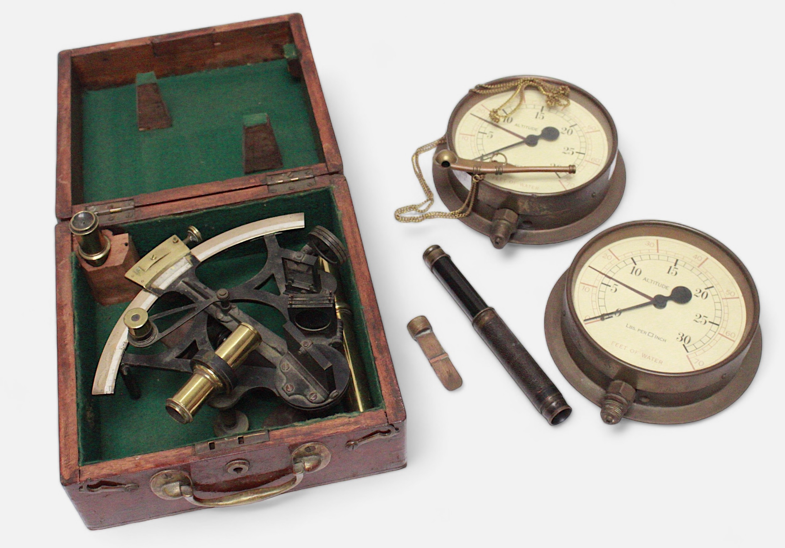 A collection of assorted maritime items including a boxed sextant, a bosuns call, a threaded ships