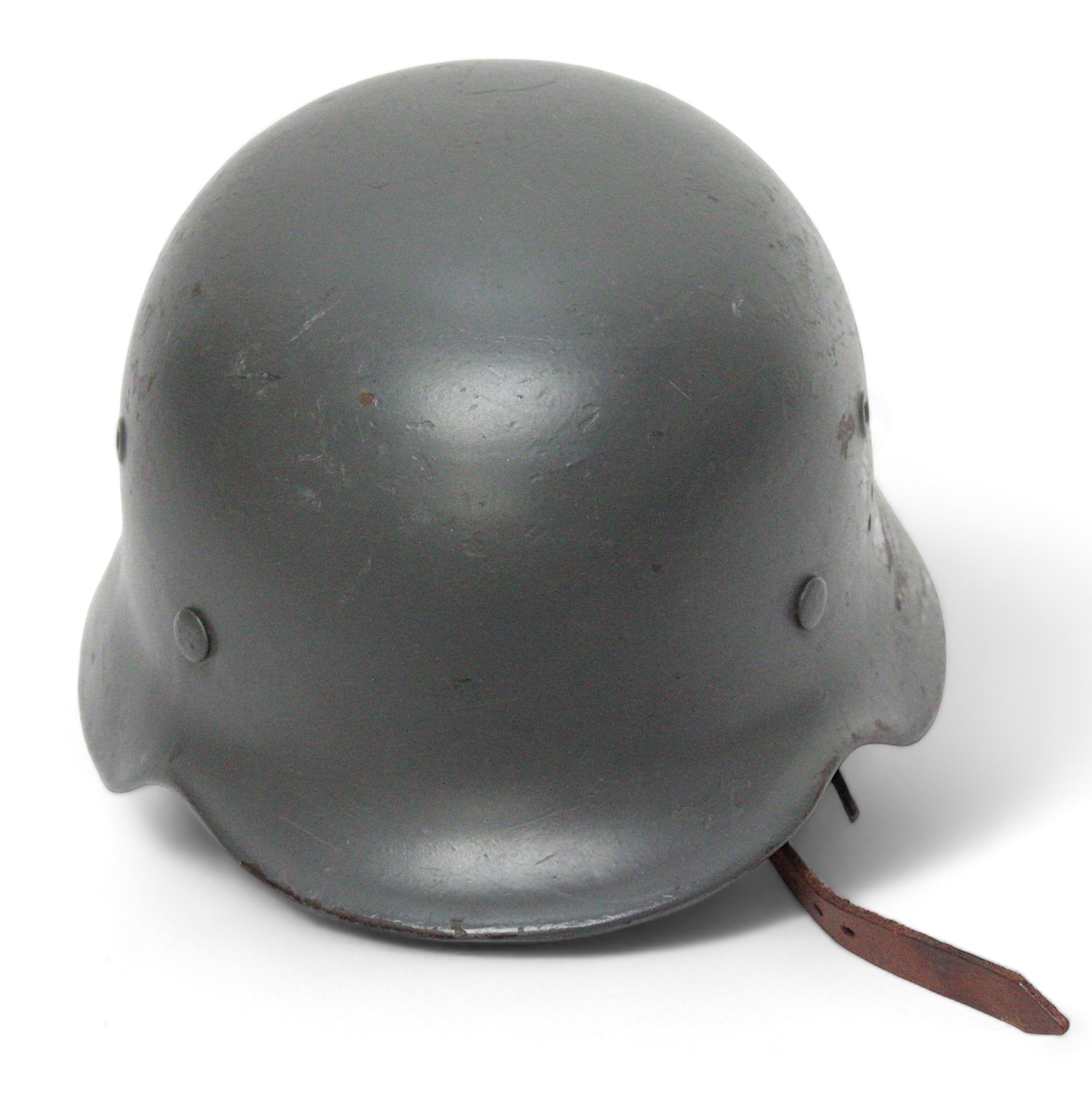 A WWII German Third Reich M40 Helmet, stamped SE64 / 7934, eight-tongue leather liner, size 57, grey