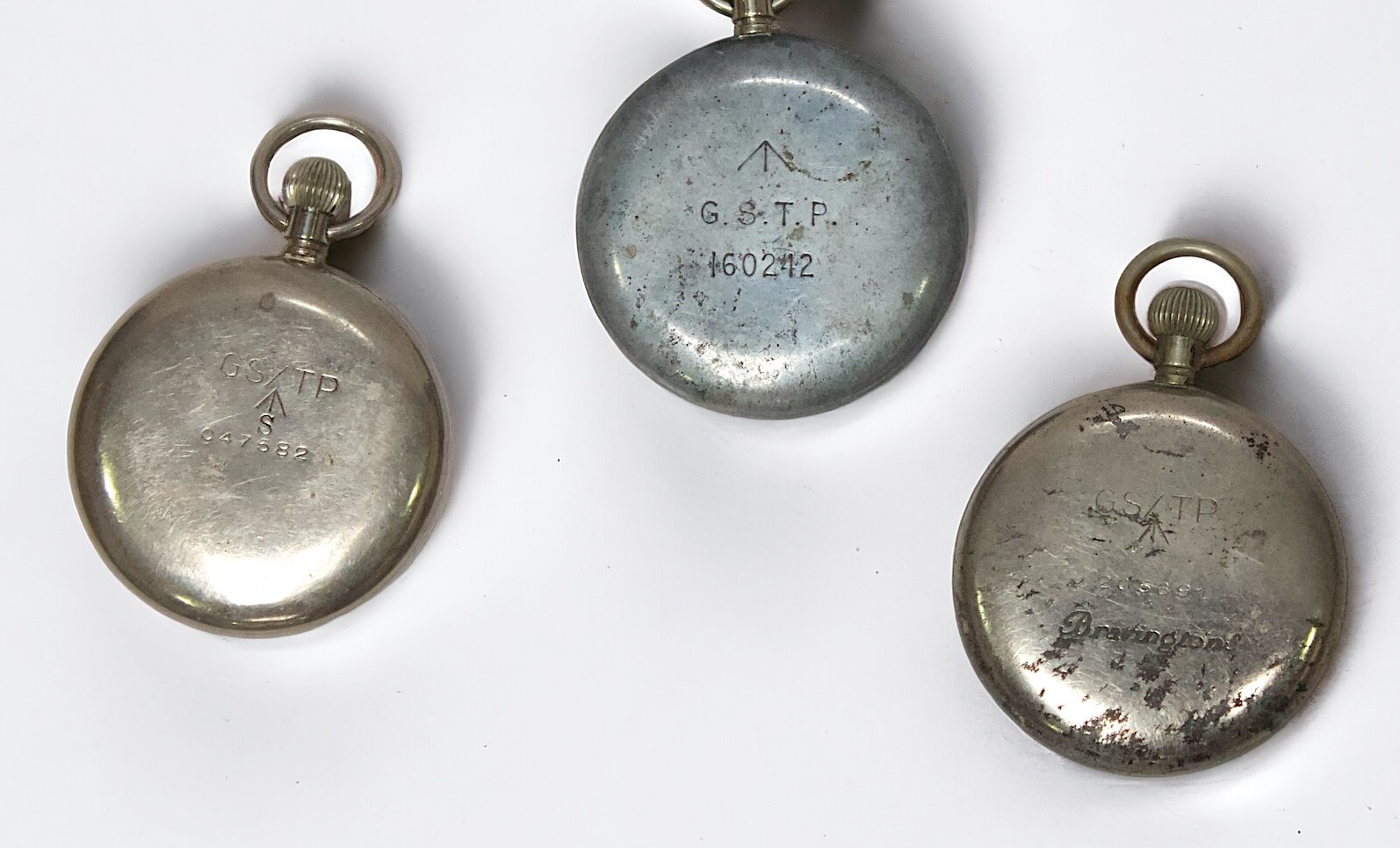 Three various white-metal Military Issue open face pocket watches, including an example by - Image 2 of 2