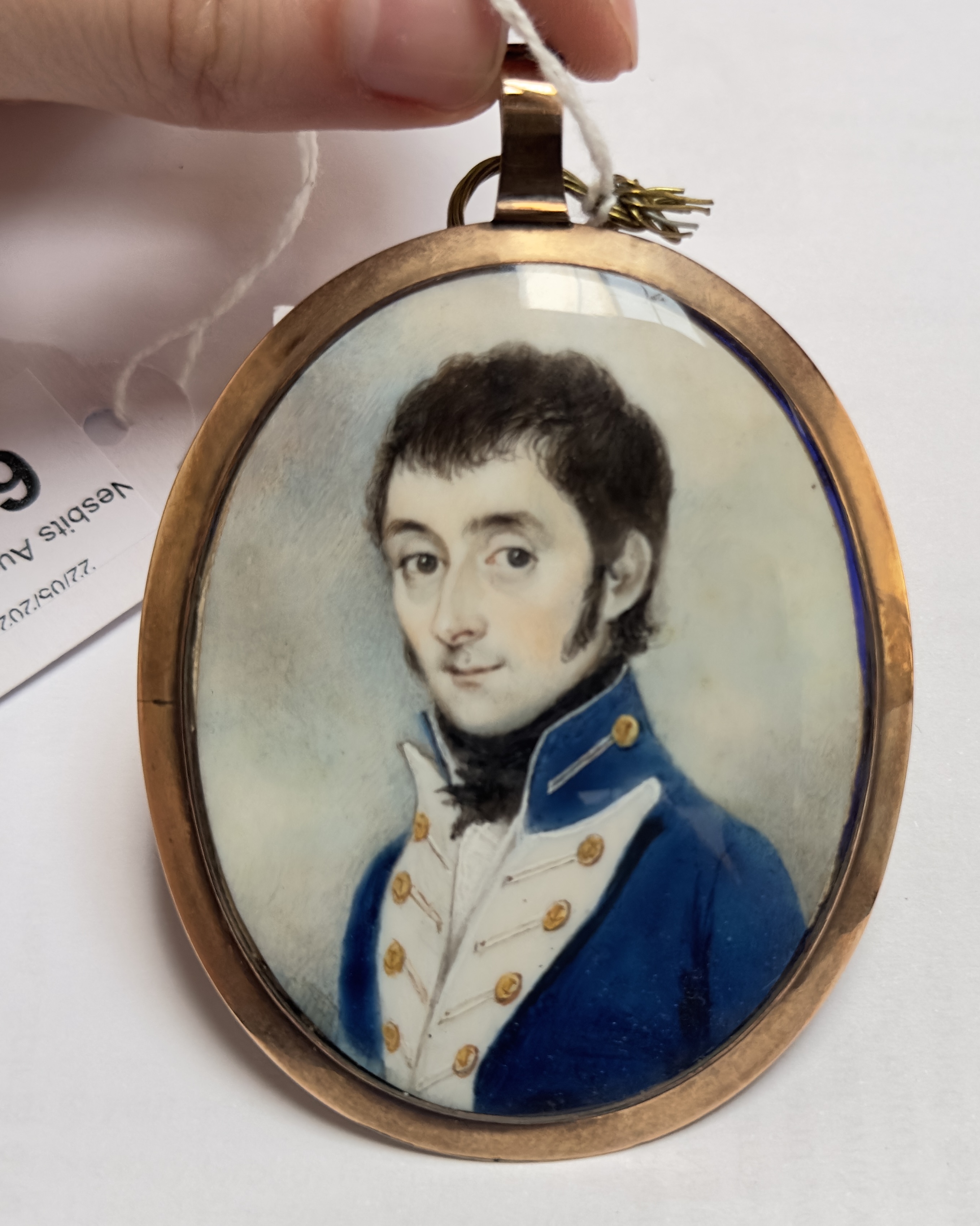 An early 19th century oval locket-back portrait miniature of a Junior Naval officer, with dark brown - Image 5 of 6