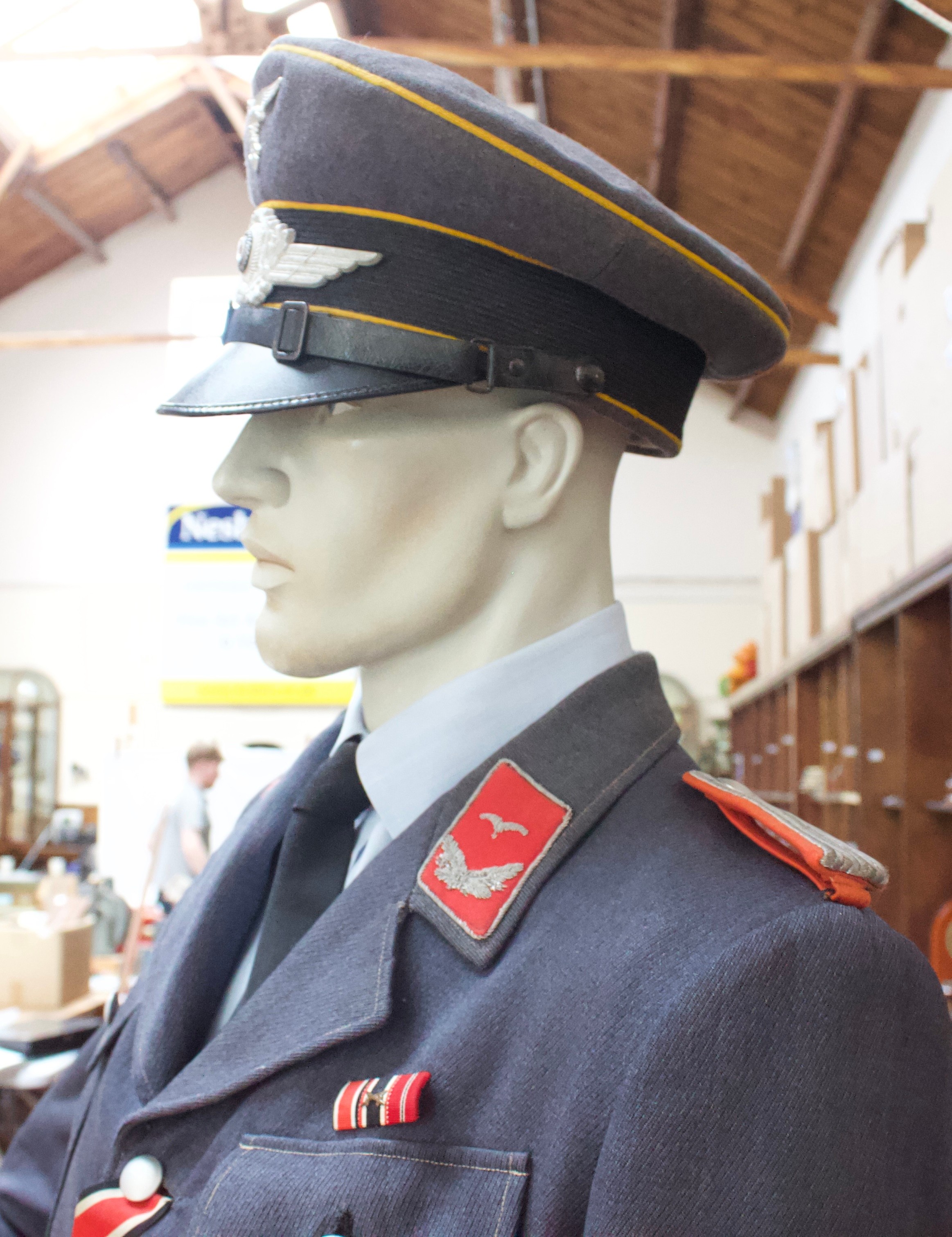 A WWII German Third Reich Luftwaffe uniform on mannequin dummy, comprising peaked cap, jacket with - Image 3 of 5