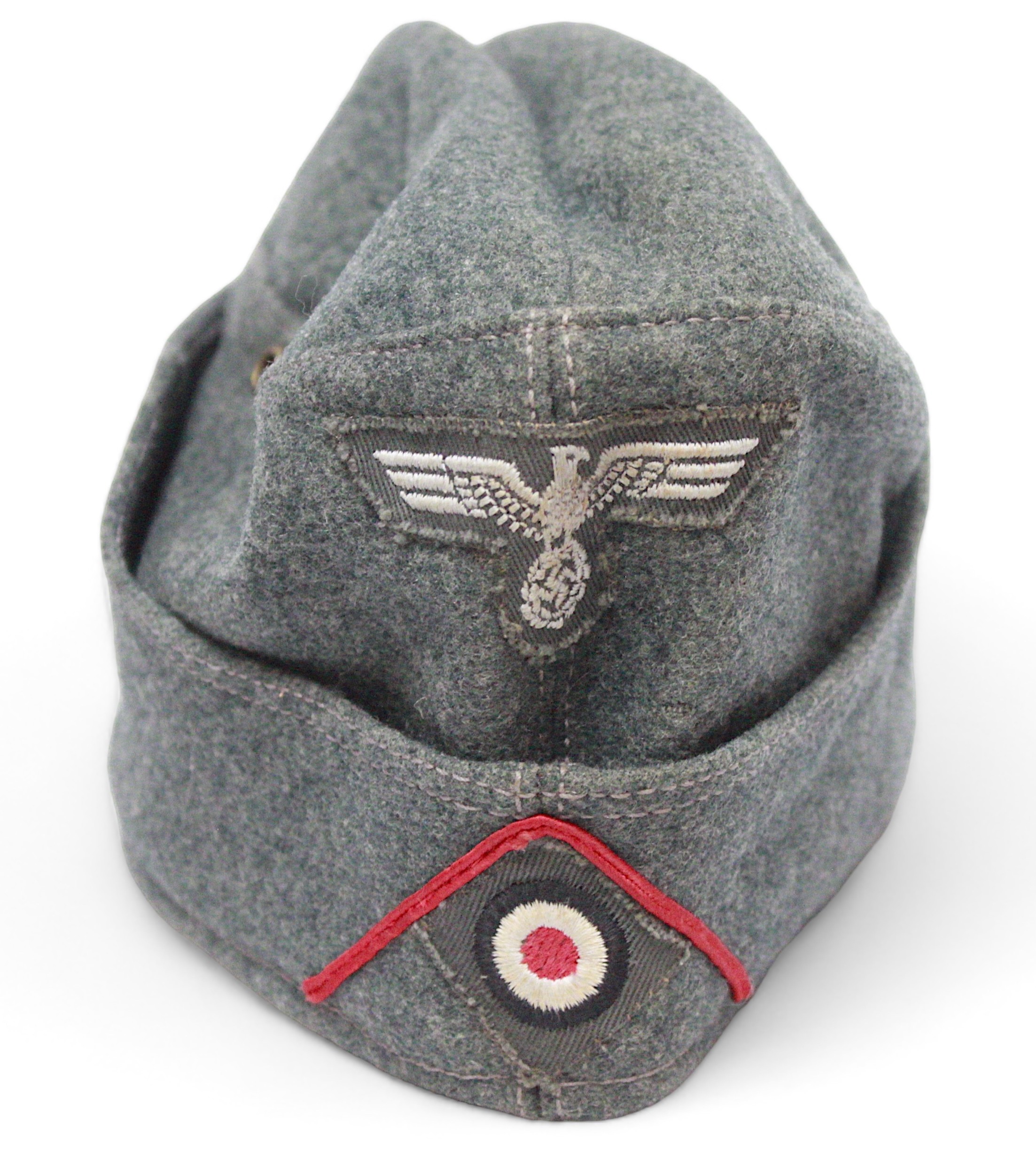 A WWII German Third Reich Overseas Artilery M38 Side cap, with original bevo cap eagle and cockade - Image 2 of 3