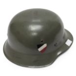 A WW2 German Third Reich M42 helmet, with nine tongue leather liner, stamped numbers inside