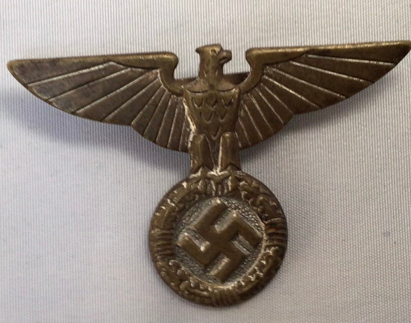 WWII German Third Reich: Four campaign shields, and seven various badges. (11) - Image 6 of 8