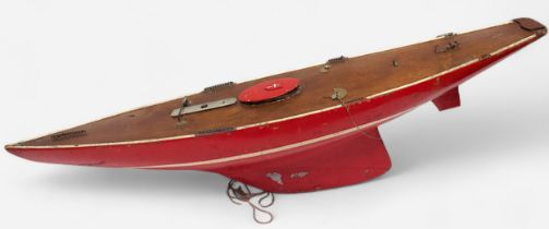 A vintage red painted Marblehead class pond yacht, with white painted stripe to hull, some parts