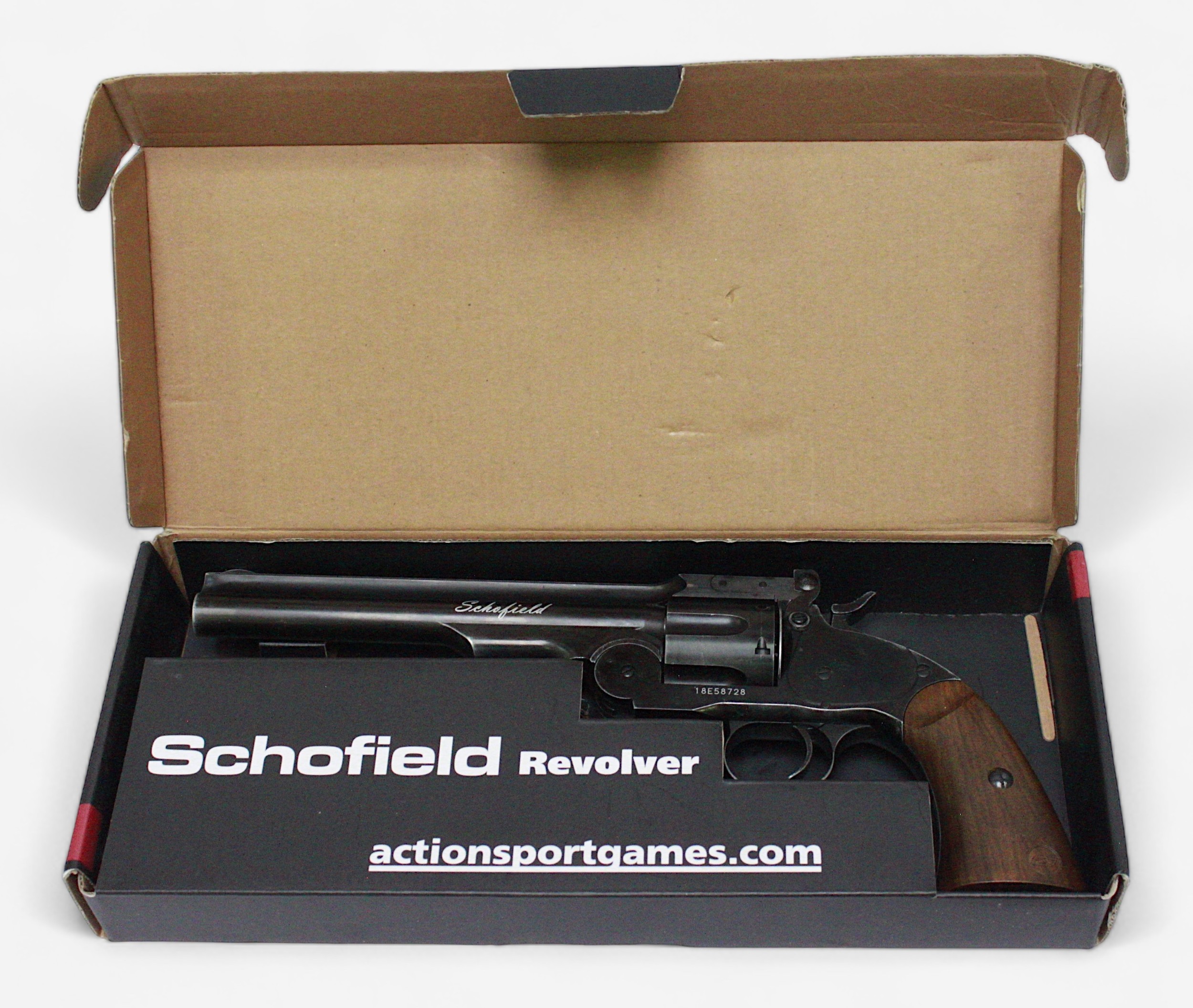 A Schofield 6' Co2 air revolver, .177 calibre pellets, with branded 18cm barrel, wooden grip and