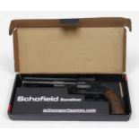 A Schofield 6' Co2 air revolver, .177 calibre pellets, with branded 18cm barrel, wooden grip and