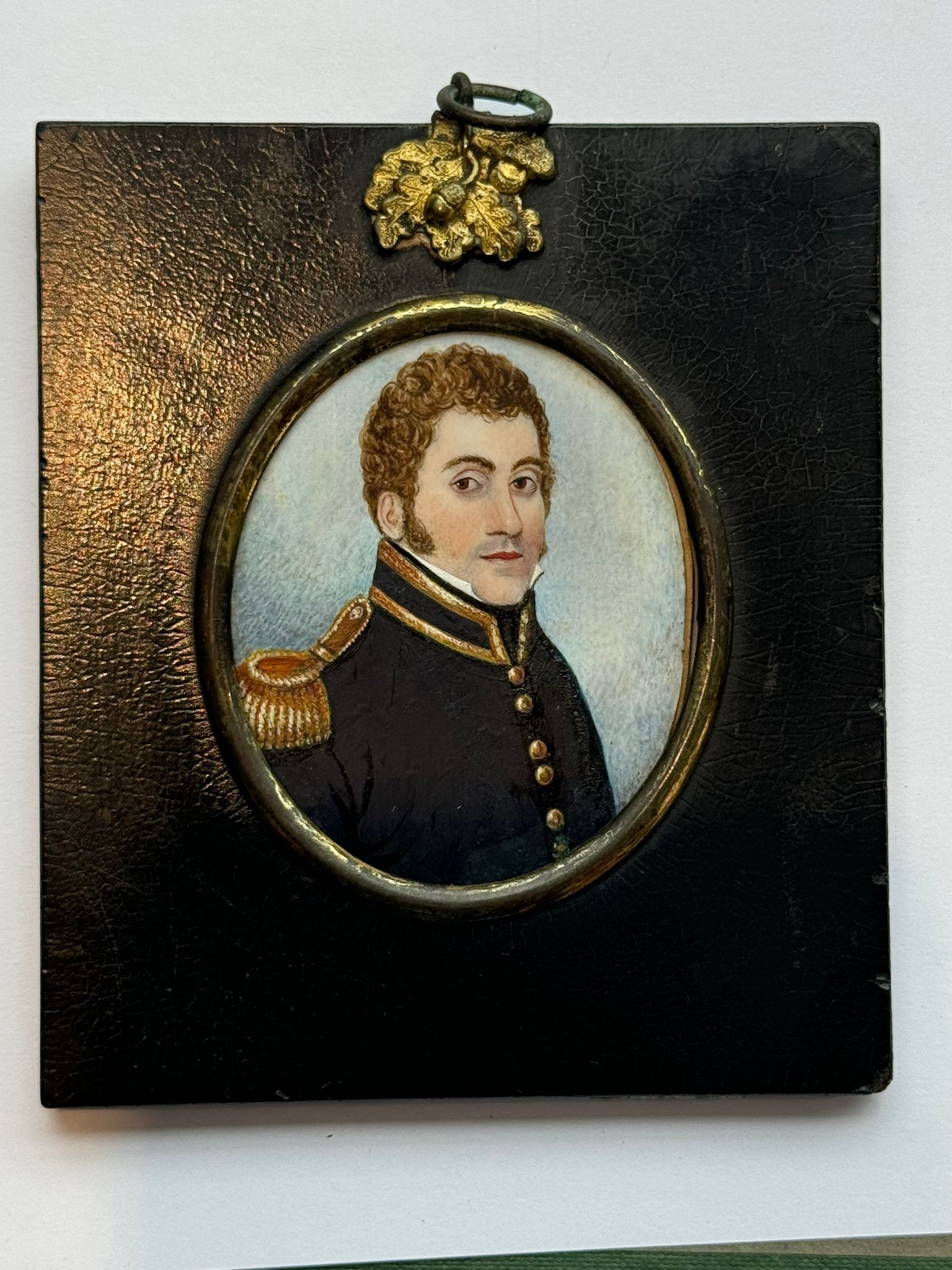 A 19th century oval portrait miniature of a naval officer, with brown curly hair and short - Image 3 of 3
