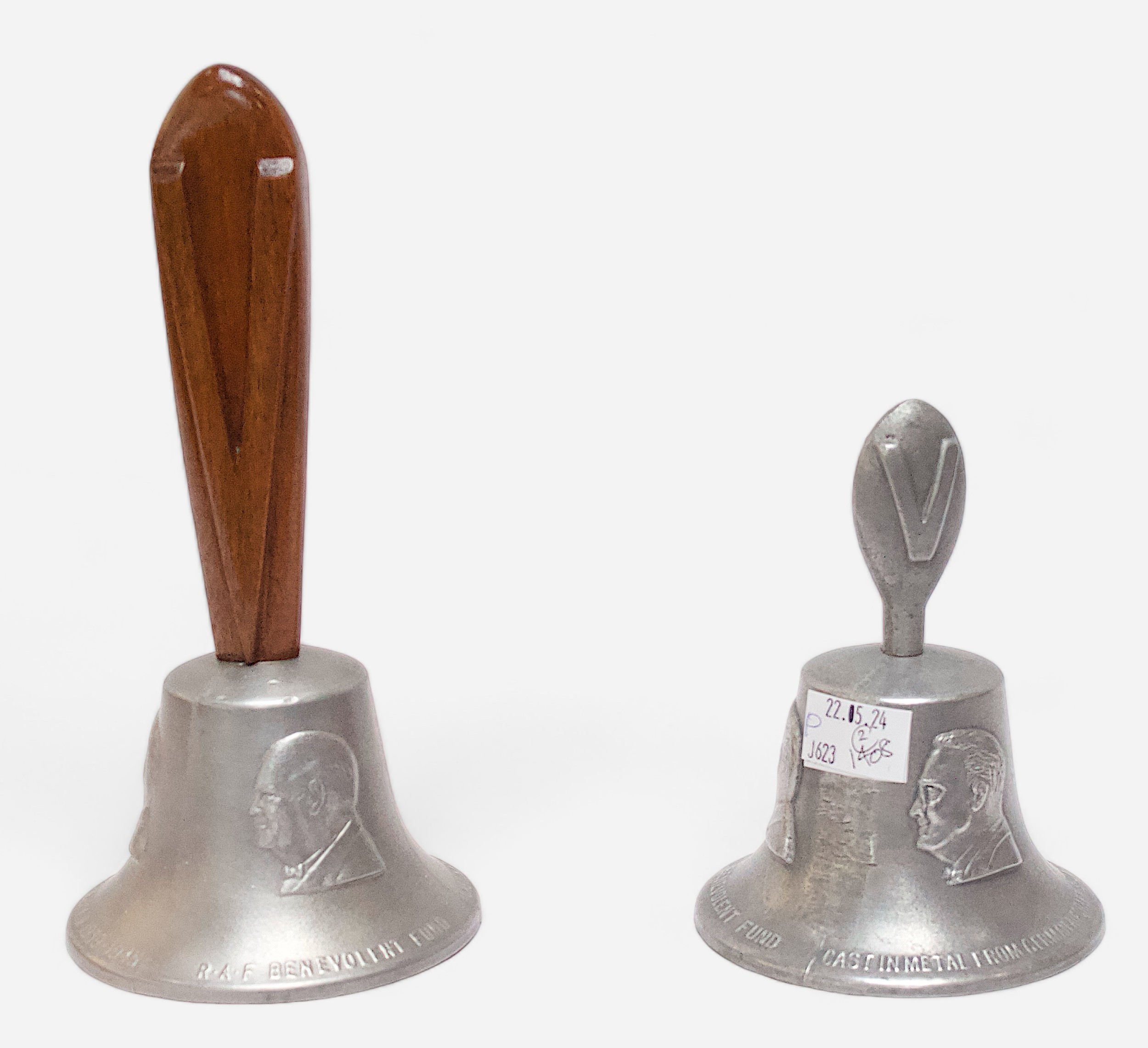 Two alloy handbells, each cast with the cameo portraits of the WWII Allied leaders, Roosevelt,