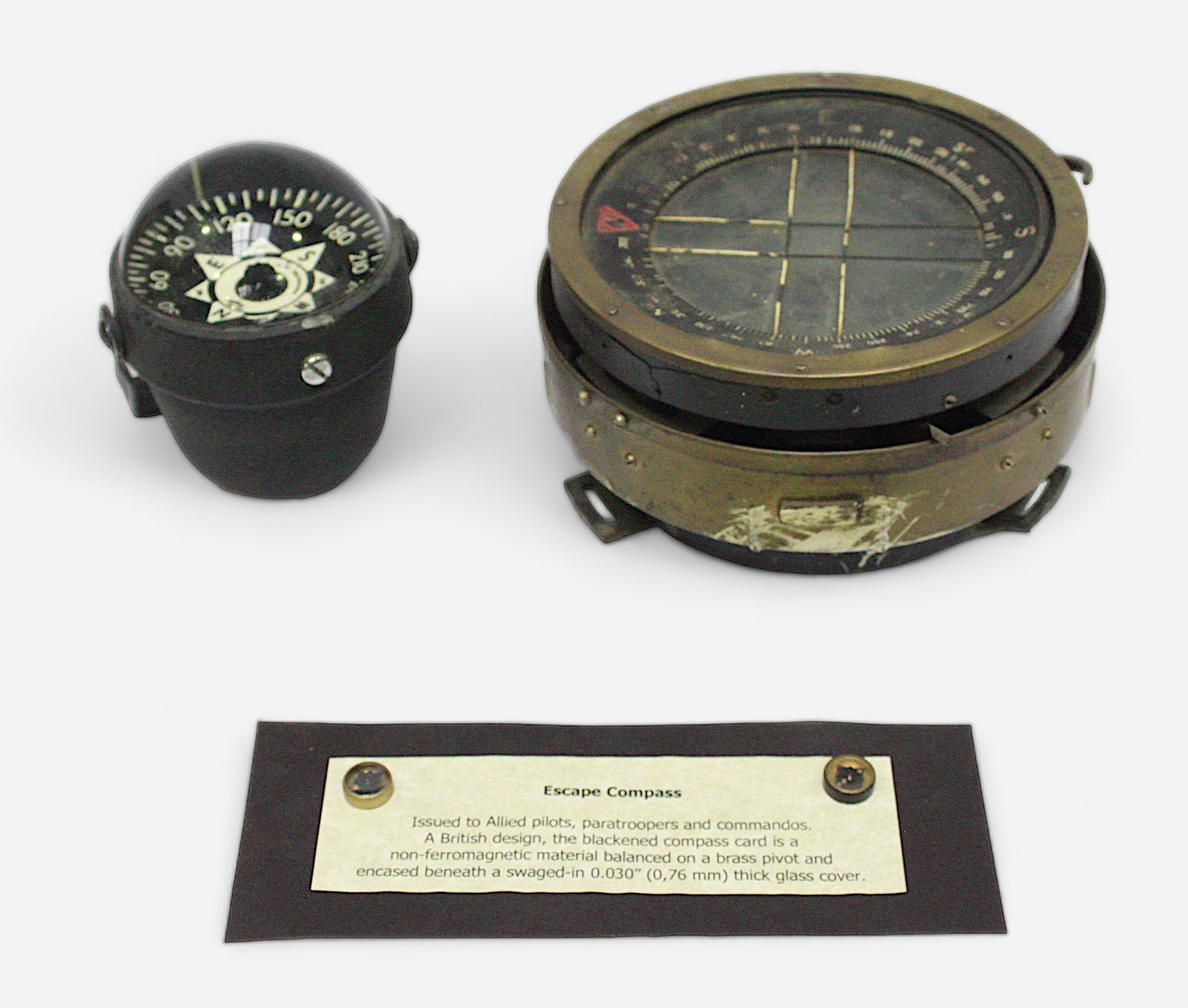 Two WWII RAF/SOE escape and evasion compasses, together with, an RAF aircraft cockpit compass,