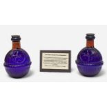 Two Harden Company blue glass Star Hand Grenade Fire Extinguishers, No. 10490, with liquid