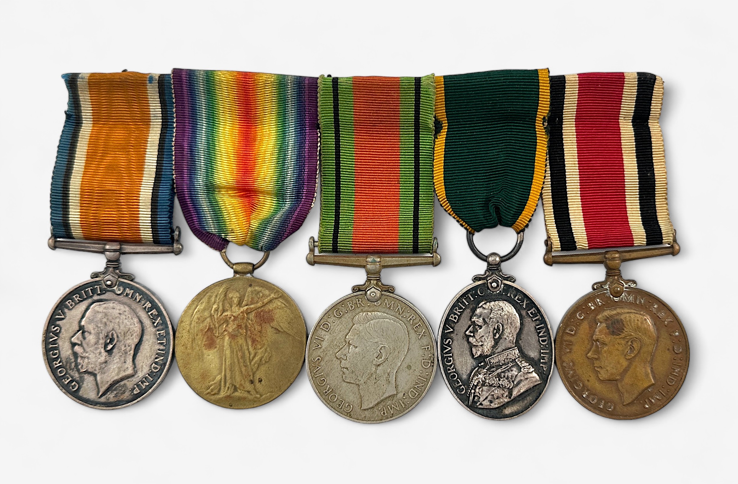 A WW1 and WW2 group comprising War Medal and Victory Medal to 17550 Pte. C.R. TAYLOR NORF. R. (
