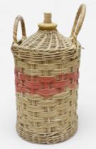 A Royal Navy Pusser's Rum stoneware pottery flagon in twin-handled wicker-work outer jacket (