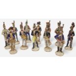 Twelve Italian Porcelain figures of French and European Military figures, each inscribed to the