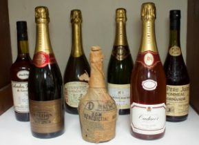 A collection of assorted champagne and liqueurs, comprising Benedictine D.O.M., in original paper,