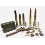 A collection of brass shell cases including Bofors 40mm -7mm, machine-gun belt, stripper clips for