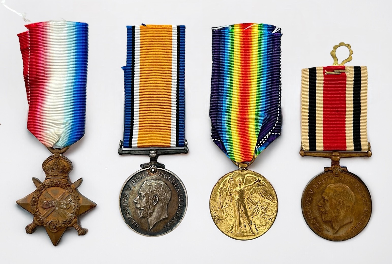 A WW1 Royal Sussex Regiment group to 2449 PTE. S. READ, comprising 1914-15 Star, War Medal and