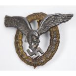 A German Luftwaffe Pilot-Observer qualification badge, worn gilt wreath with central silvered