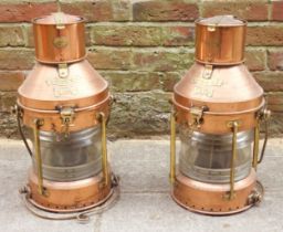 Two copper and brass Anchor lamps by R. C. Murray & Co. Numbered 1381 and 1382, of typical form,