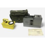 Three various British military issue radiological instruments, comprising a Meter Dose-Rate Portable