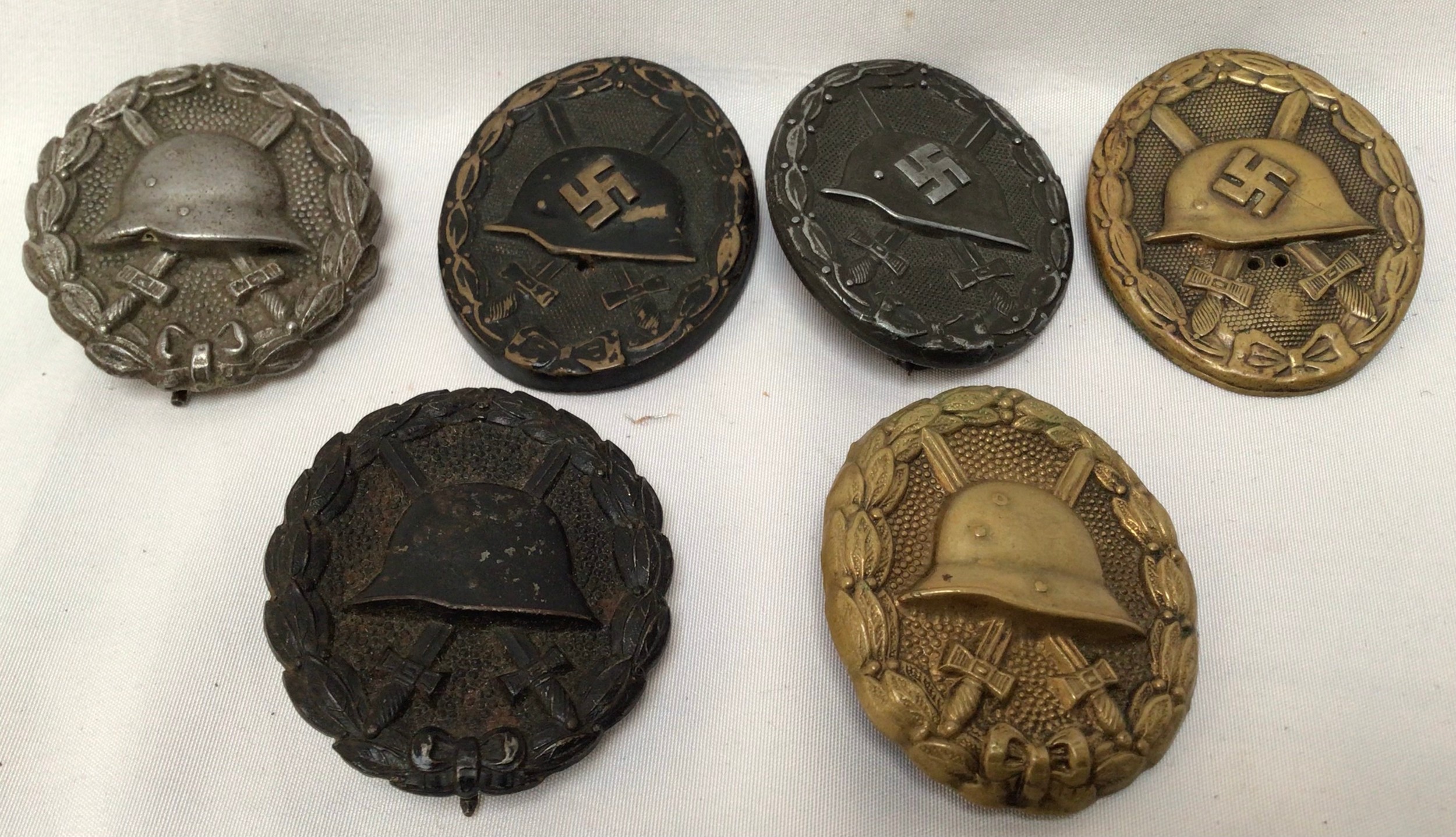 Six various German WWII military wound badges, comprising 1st, 2nd and 3rd class examples