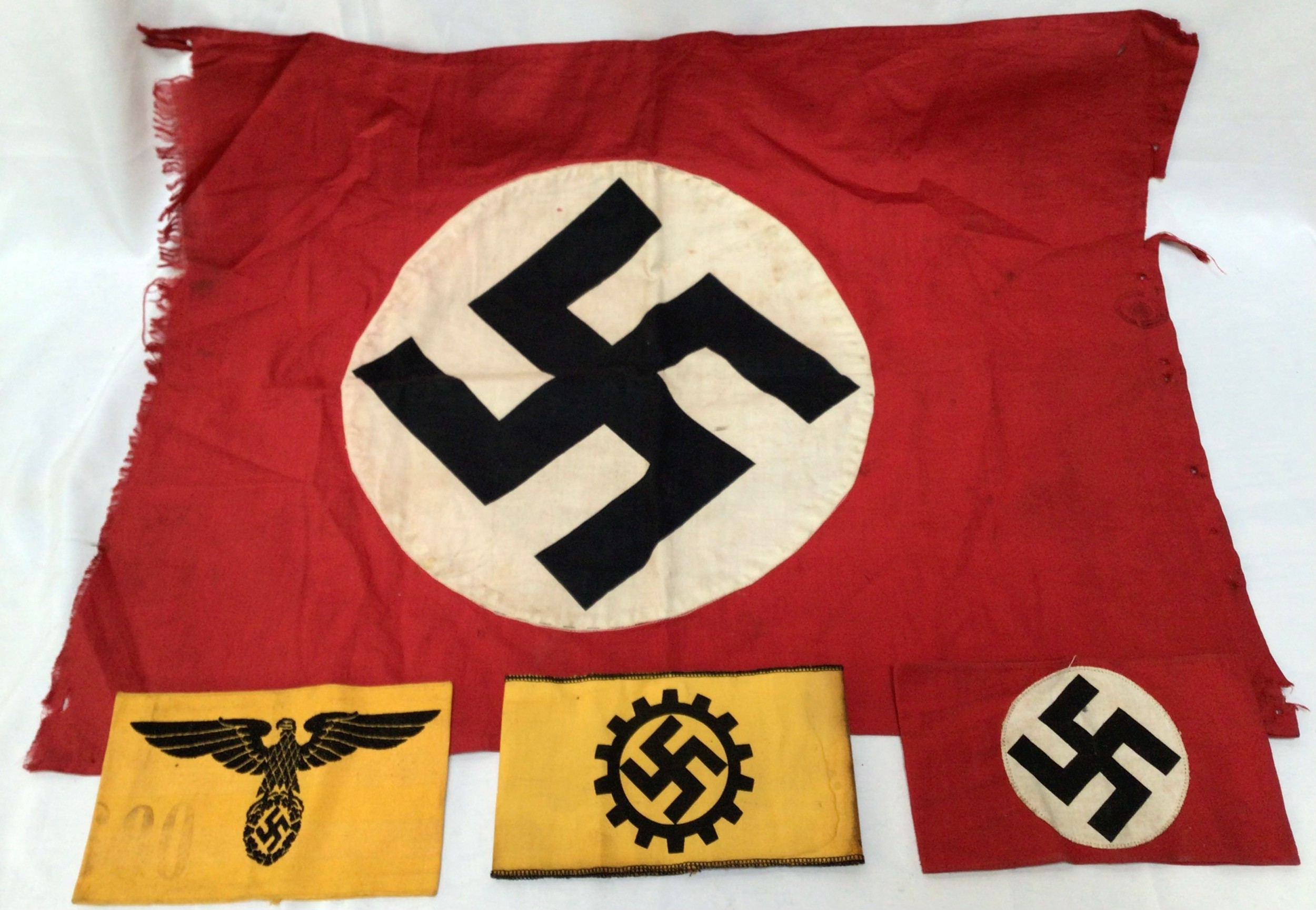 A German WWII double-sided NSDAP flag, stamped with German Labour Front (DAF) mark, 49cm x 65cm,