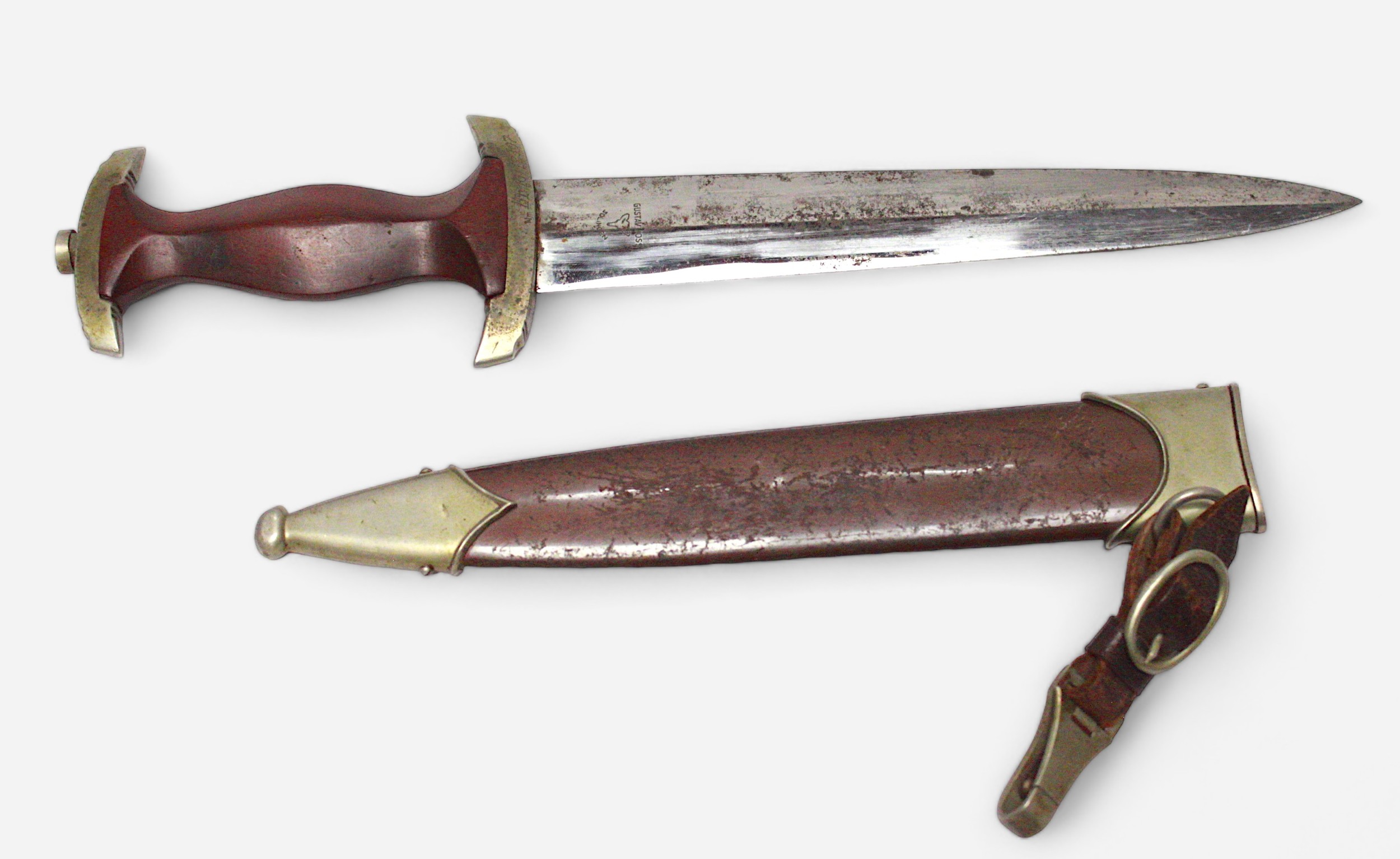 A Third Reich SA (Sturmabteilung) Dagger by Gustav Voss, Solingen, stamped to the blade and engraved