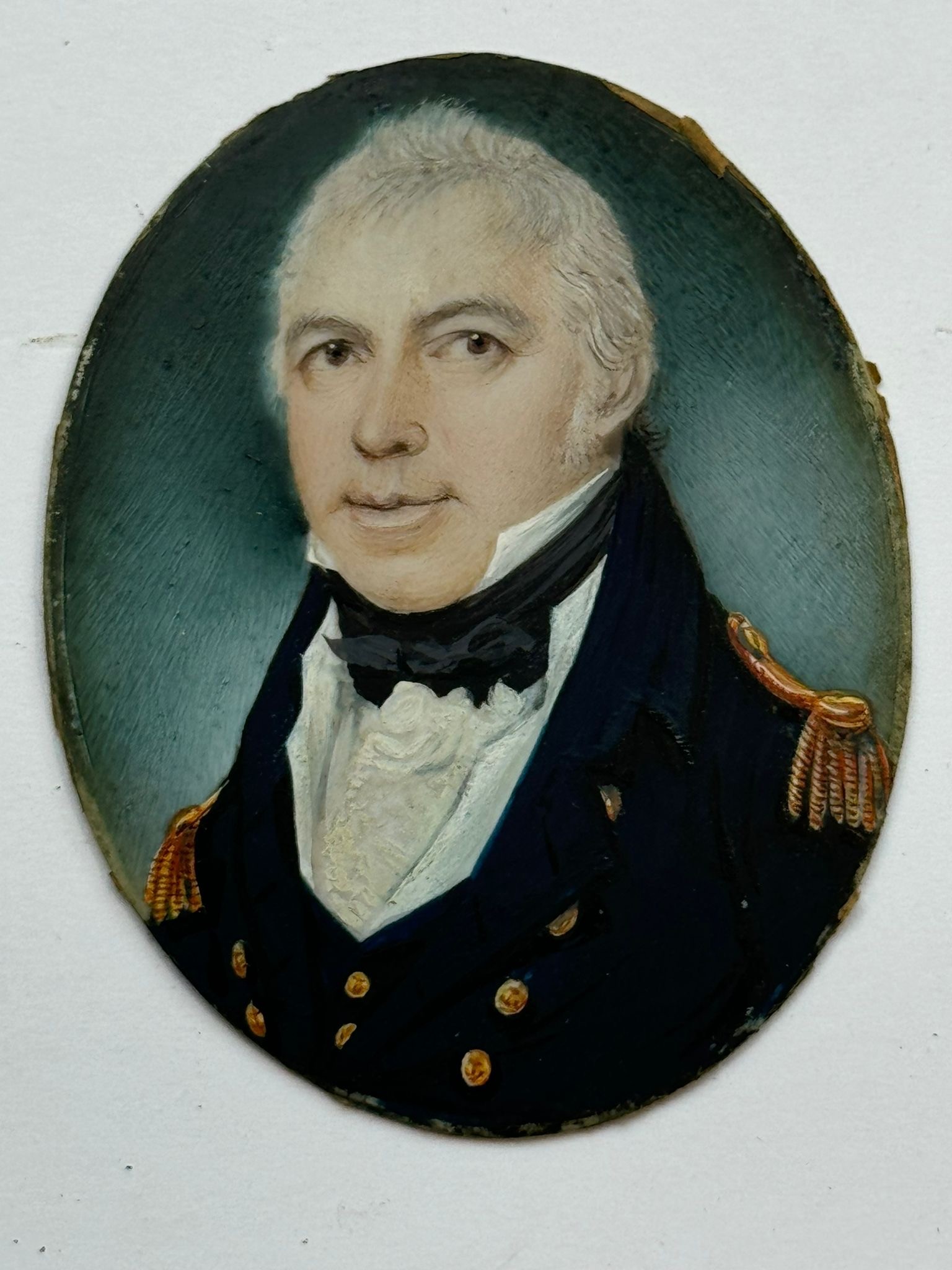 An early 19th century oval portrait miniature of a middle-aged Naval officer, with reseeding grey - Image 2 of 5