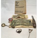 A collection of assorted Interwar and WWII German ephemera, comprising an NSDAP Third Reich style